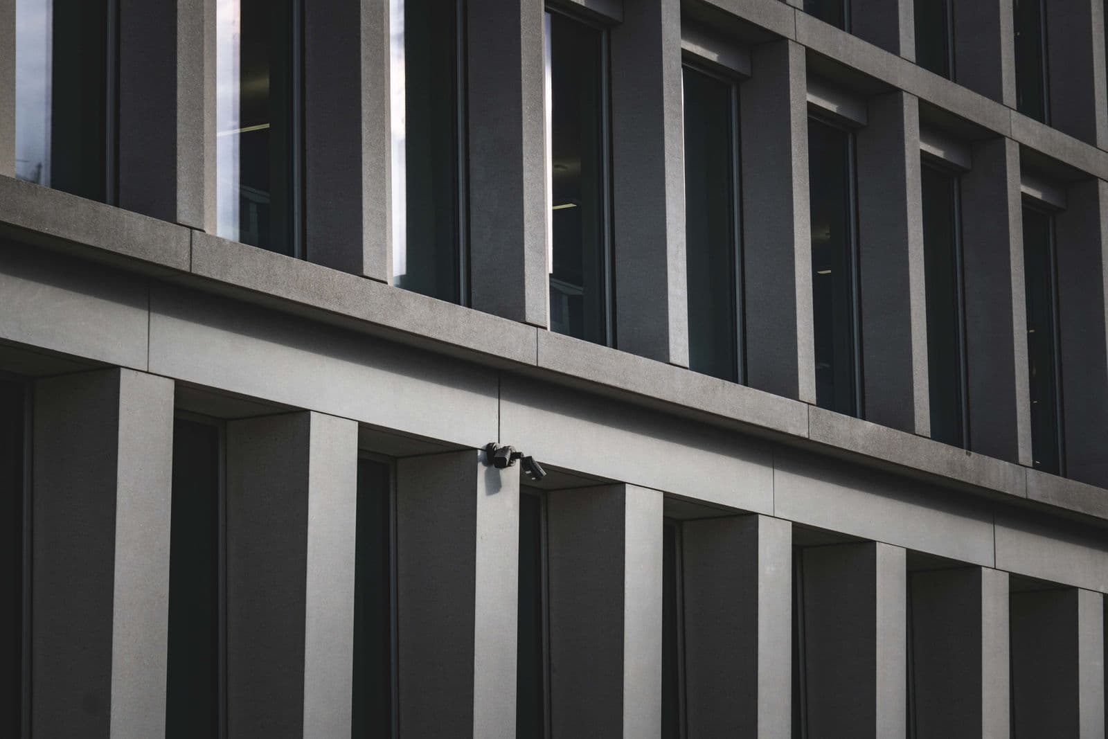 Modern building facade with reflective glass windows